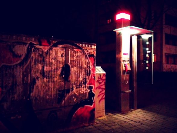 Phone booth street art on Karl Marx Allee. mobile photography