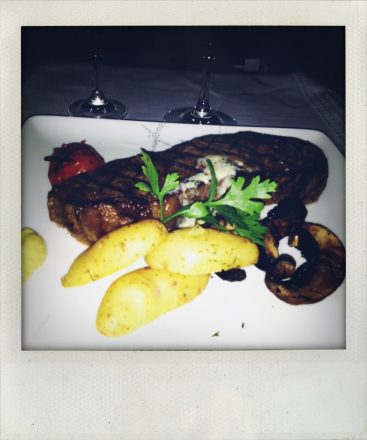 Filet and potatoes that I didn't eat. Cathay Pacific First Class HKG-LAX (mobile photography, shake it app)