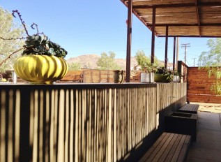 The outdoor patio area of Room 5, the suite, at this funky Joshua Tree motel