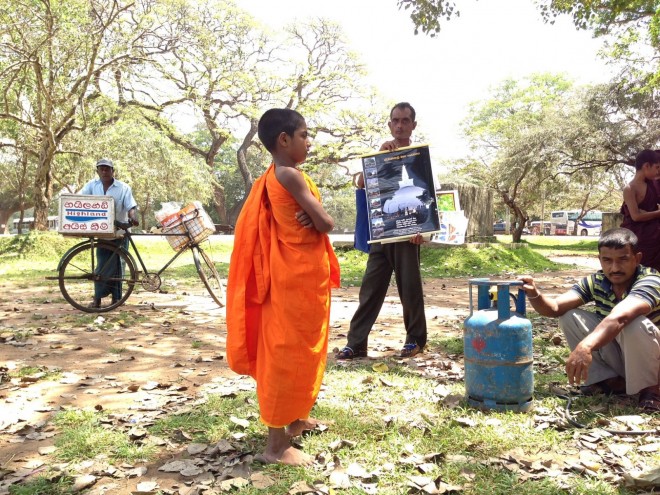 A novice monk in saffron robes in Anuradhapura, located in the country's cultural triangle (ProCamera)